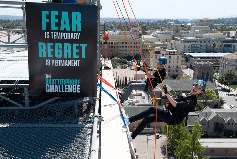 Executives Rappel Down Skyscrapers for Addiction Awareness