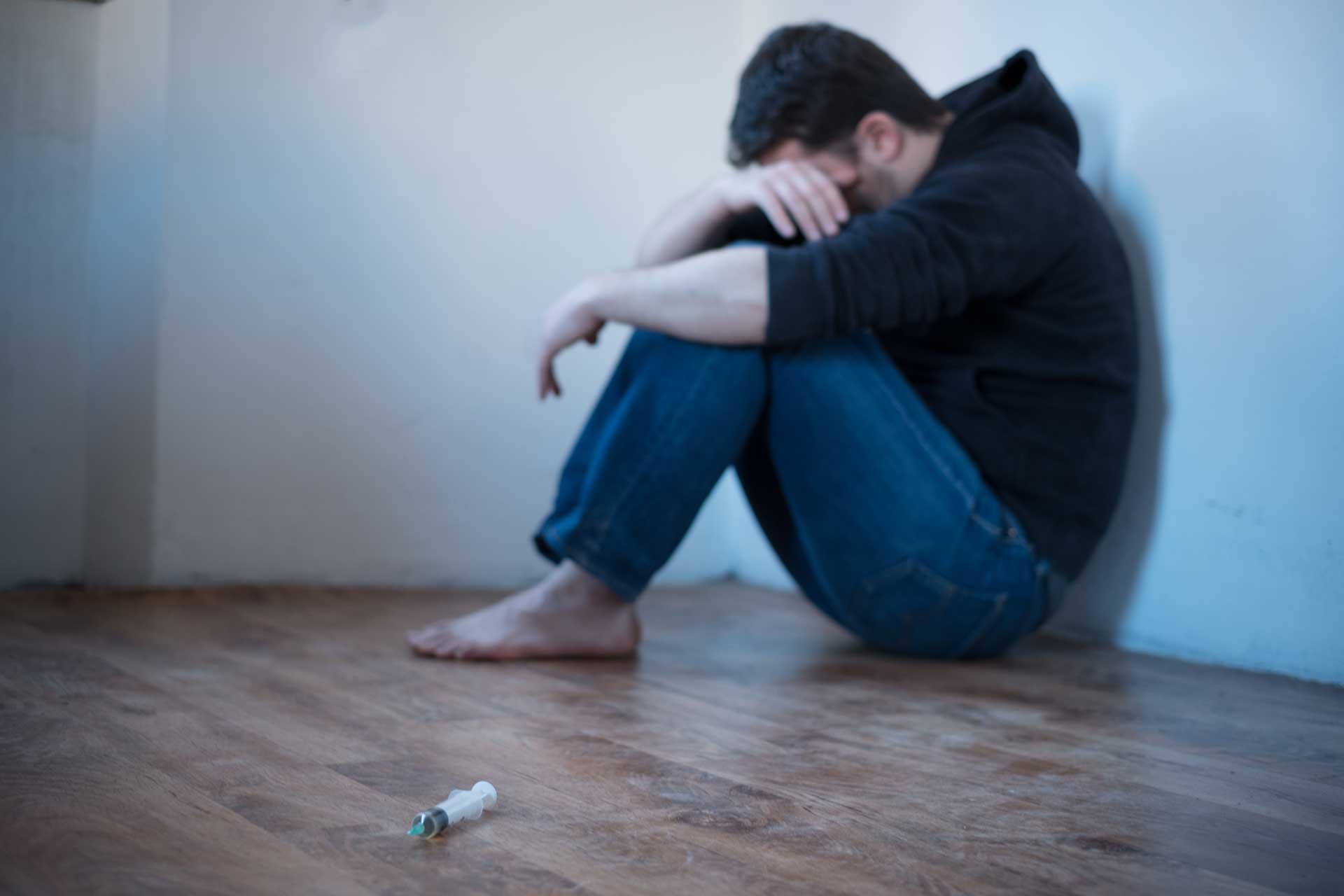 Sad man suffering from a heroin use problem | Morningside Recovery